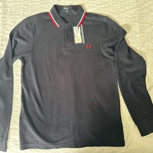 Fred Perry long sleeve pique polo. Navy size small.